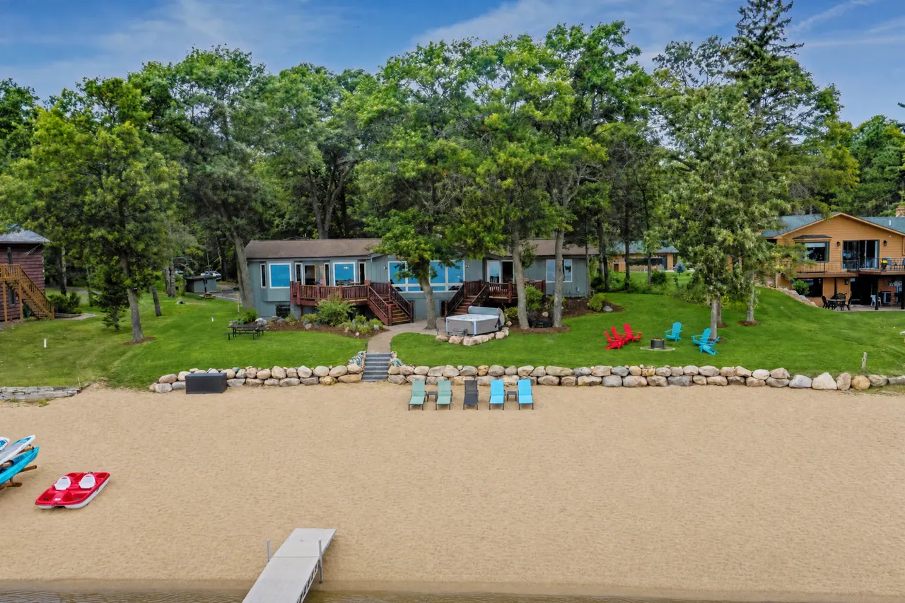 The beach, the lawn and the lake-facing house from above