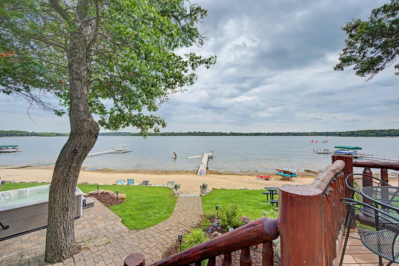 The lawn, beach and dock seen from the deck